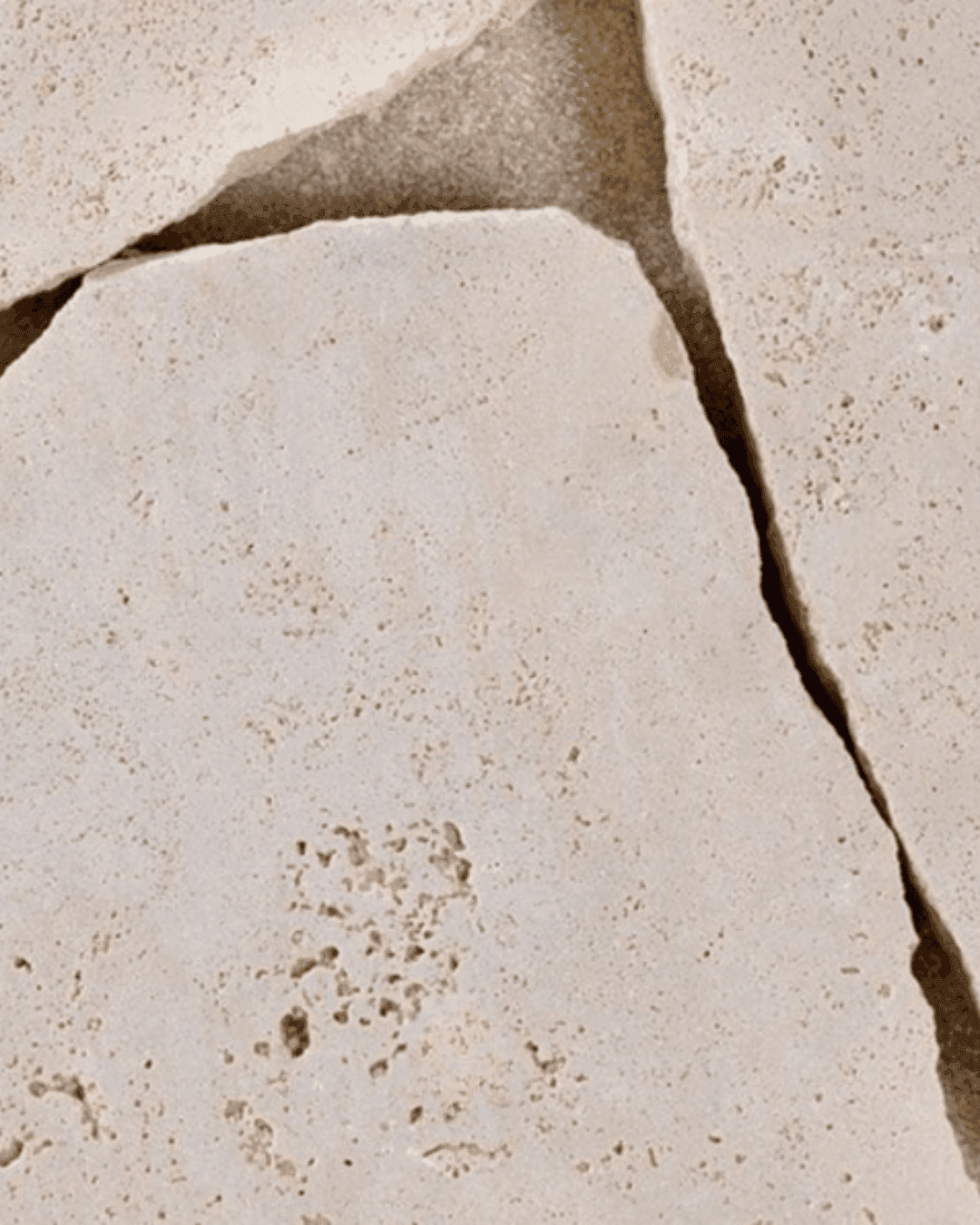 Travertine...Ivory and caramel layers with natural pores and gentle texture.